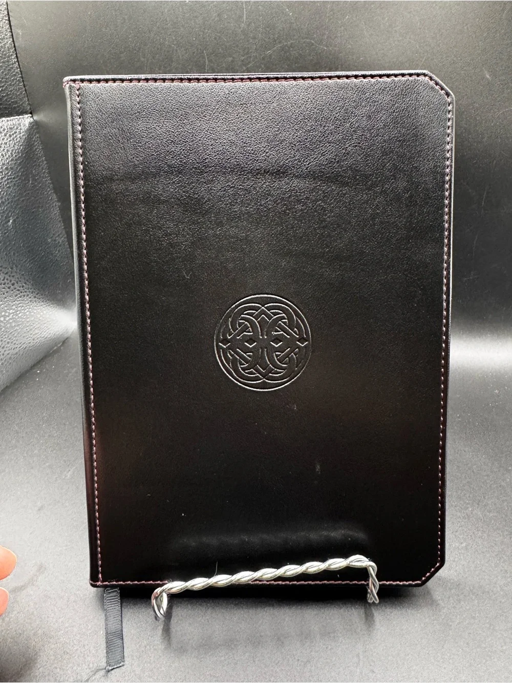 Franklin-Christoph Firma-Flex Notebook featuring a debossed circular Celtic knot